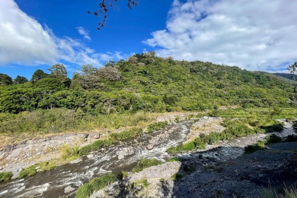 Serene flat land for sale with mountain views