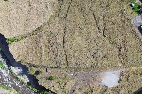 Serene flat land for sale with mountain views