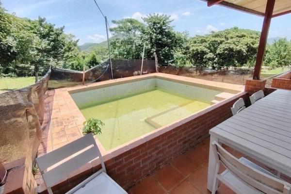 Granja de 13.6 ha con casa, galeras y río en natá, coclé
