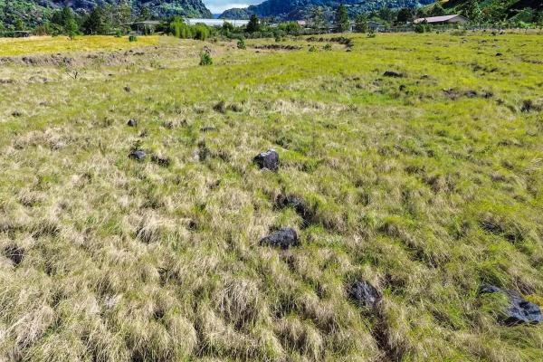 Serene flat land for sale with mountain views