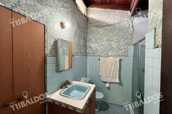 Venta de terreno con mejoras en el carmen