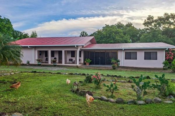 Riverfront home with greenhouse in dos rios
