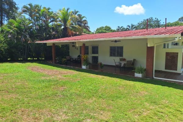 House in playa corona with large land