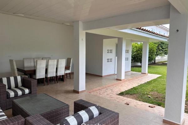 Golf palm trees 525,000 neg near serene beach
