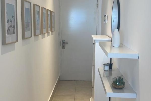 Apartamento moderno de 2 habitaciones frente al mar en playa malibú
