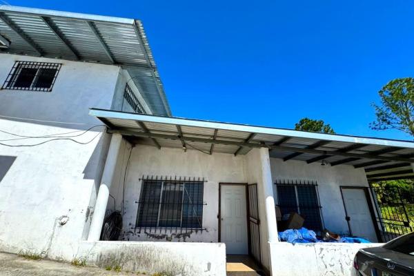 Commercial building with apartments for sale