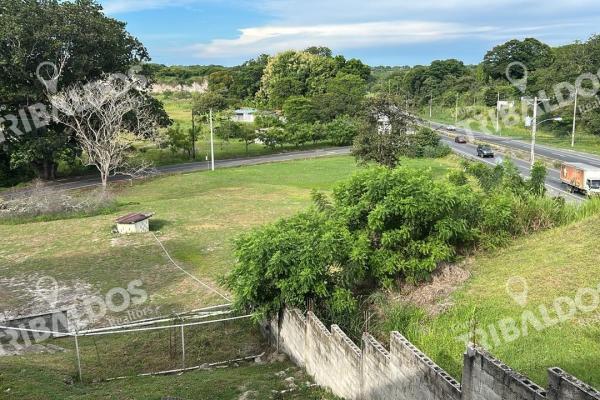 Venta de terreno con mejoras en san carlos, frente a la panamericana