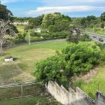 Sale of land with improvements in san carlos, facing the pan-american highway