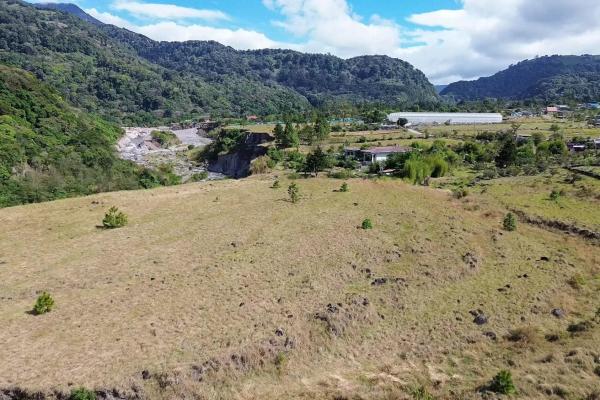 Serene flat land for sale with mountain views