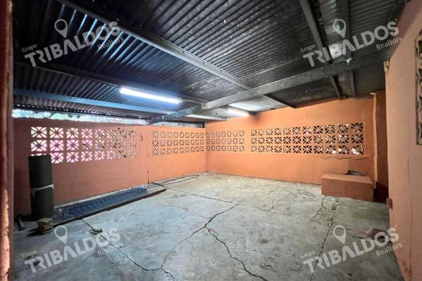 Venta de terreno con mejoras en el carmen