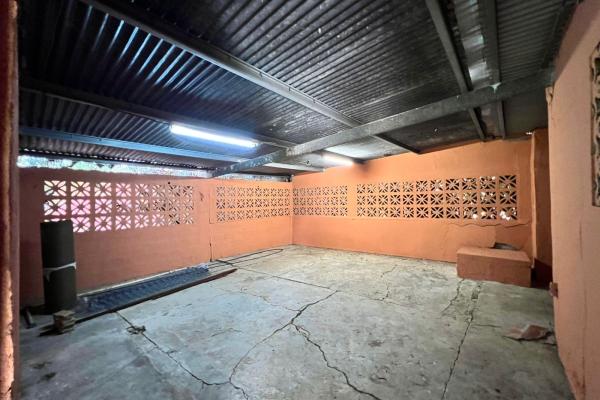 Venta de terreno con mejoras en el carmen