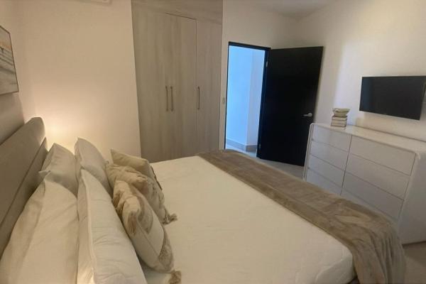 Apartamento moderno de 2 habitaciones frente al mar en playa malibú