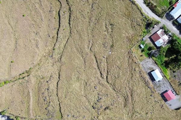 Serene flat land for sale with mountain views
