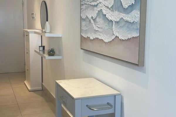 Apartamento moderno de 2 habitaciones frente al mar en playa malibú