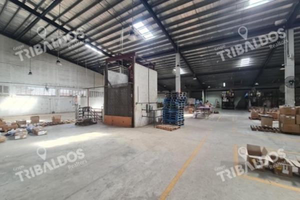 Venta de edificio con amplia bodega y oficinas en la ciudad