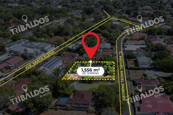 Terreno de 1,556m² en altos del golf con casa colonial para restaurar