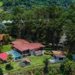 House and hotel for sale