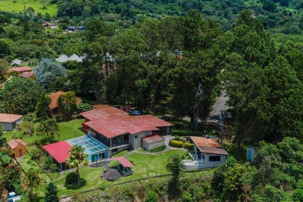 House and hotel for sale