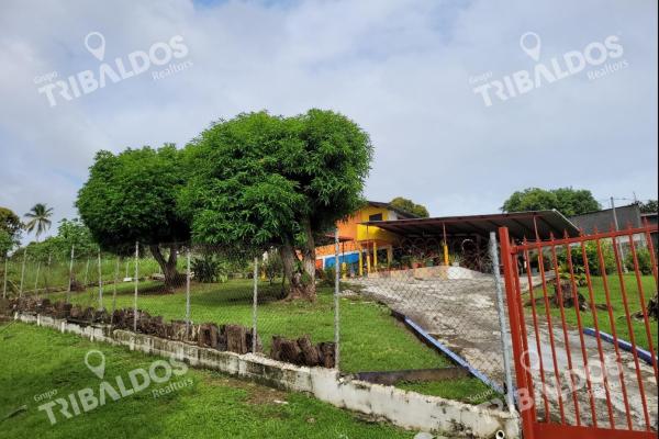 Venta de terreno con mejoras en pueblo nuevo