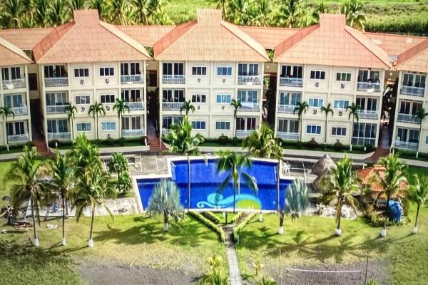 Exclusivo condominio en planta baja en playa la barqueta