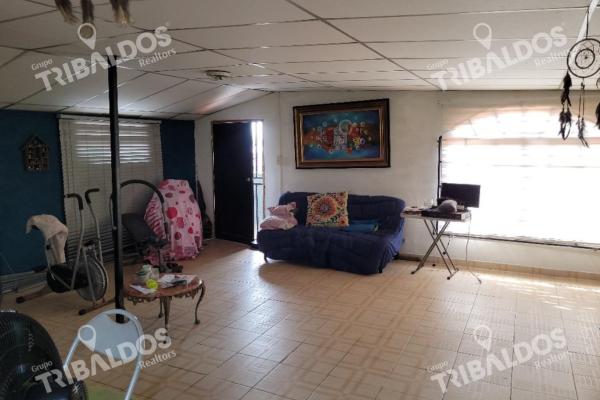 Venta de terreno con mejoras en pueblo nuevo