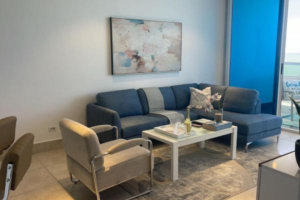 Apartamento moderno de 2 habitaciones frente al mar en playa malibú