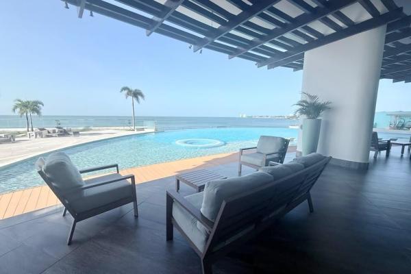Apartamento moderno de 2 habitaciones frente al mar en playa malibú