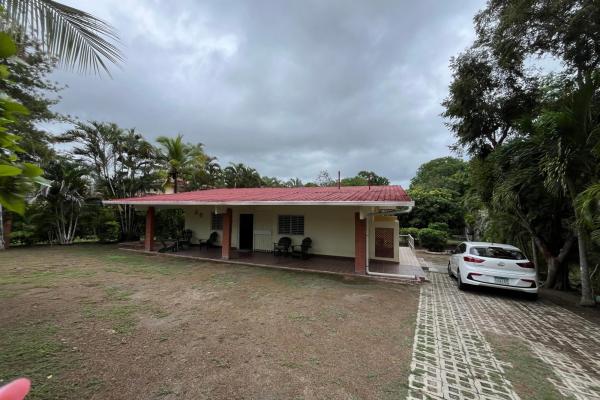 House in playa corona with large land
