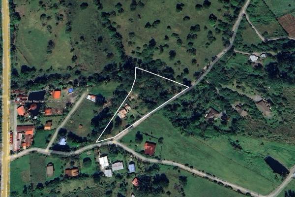 Experience the peace of volcán | land with a natural creek