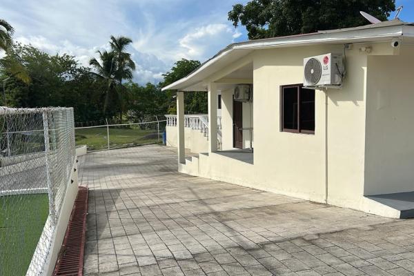 Venta de terreno con mejoras en san carlos, frente a la panamericana