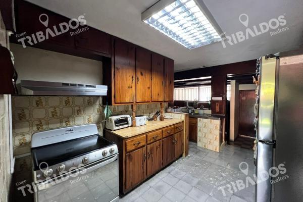 Venta de terreno con mejoras en el carmen