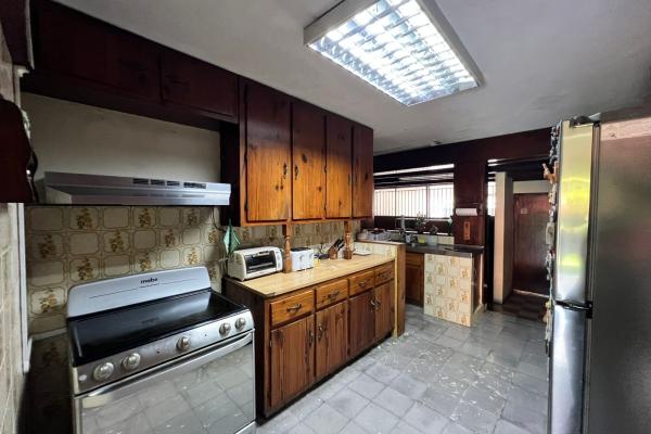 Venta de terreno con mejoras en el carmen