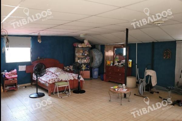 Venta de terreno con mejoras en pueblo nuevo