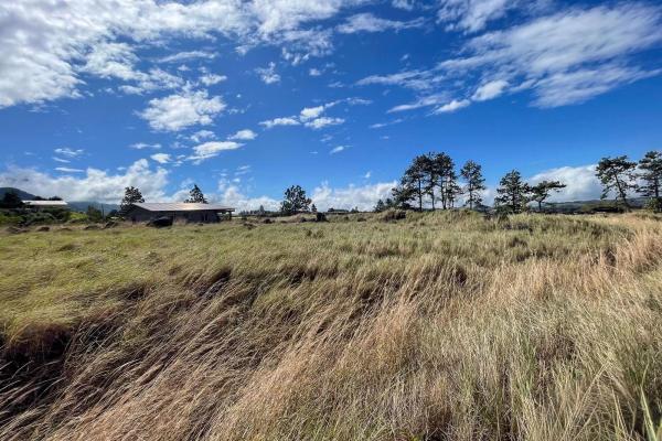 Serene flat land for sale with mountain views