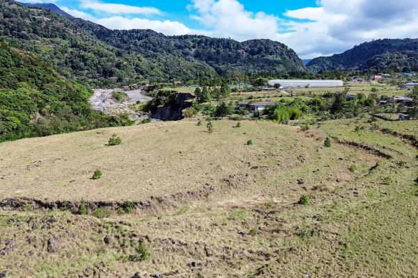 Serene flat land for sale with mountain views