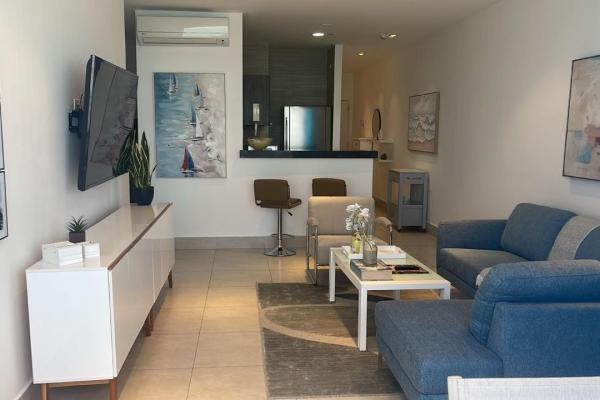 Apartamento moderno de 2 habitaciones frente al mar en playa malibú