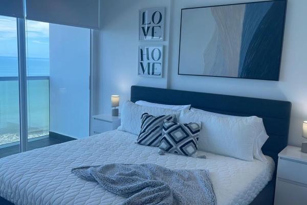 Apartamento moderno de 2 habitaciones frente al mar en playa malibú