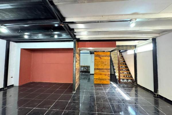 Commercial building with apartments for sale