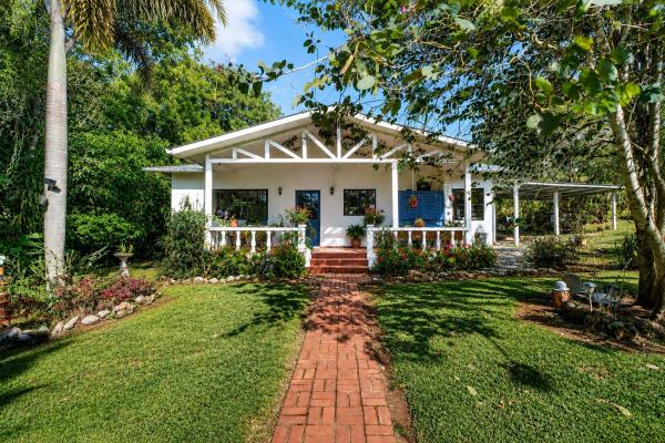 Tropical garden home potrerillos mountain views