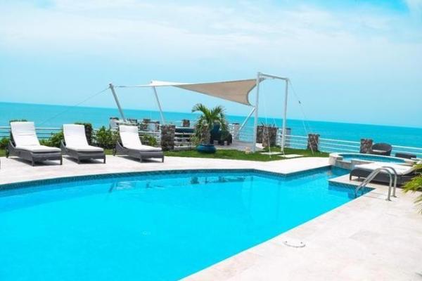 Terreno para desarrollo al lado del hotel gran evenia bijao, frente al mar
