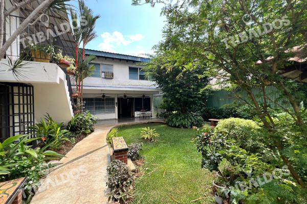 Venta de terreno con mejoras en el carmen