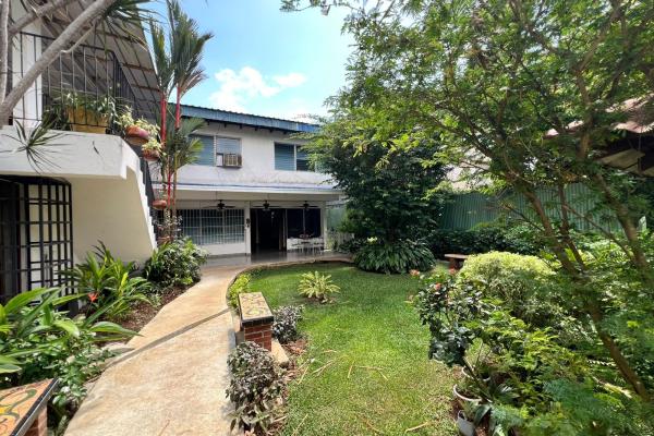 Venta de terreno con mejoras en el carmen