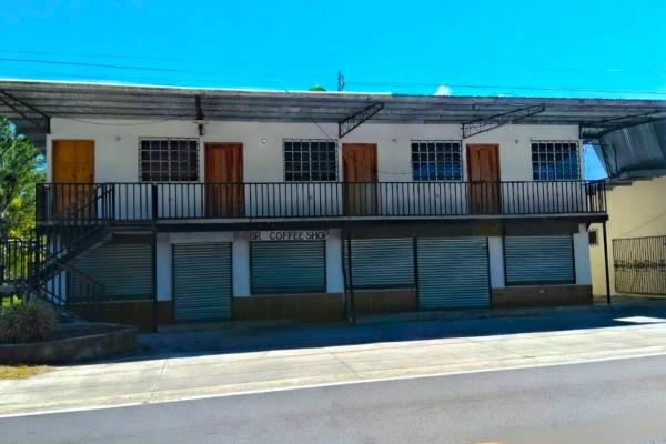 Commercial building with apartments for sale