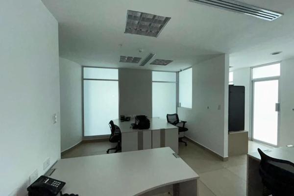 Bank sells office in bmw center building