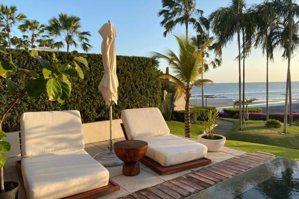 Very unique beach front condo in rio mar por sale