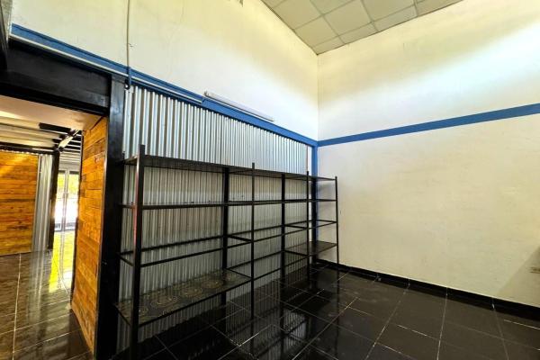 Commercial building with apartments for sale
