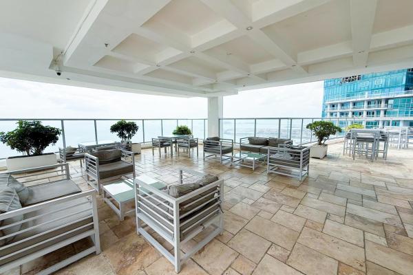Two level ocean view condo in sky