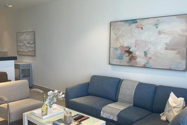 Apartamento moderno de 2 habitaciones frente al mar en playa malibú