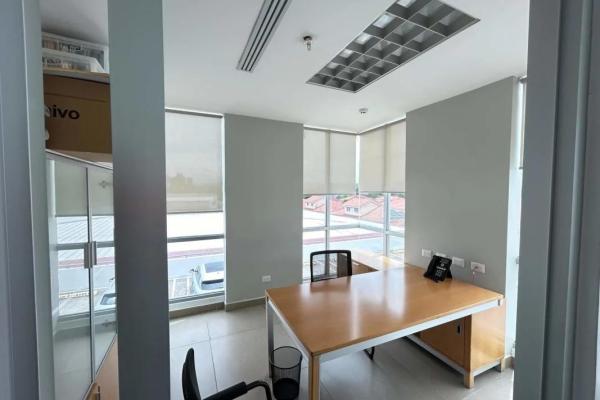 Bank sells office in bmw center building