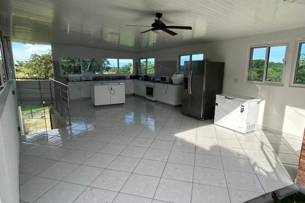 Venta de terreno con mejoras en san carlos, frente a la panamericana